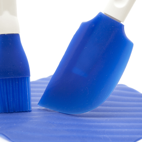 Blue molded silicone used as knife and brush